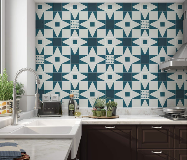 Kitchen with blue, white, and gray tile backsplash wall by clay imports