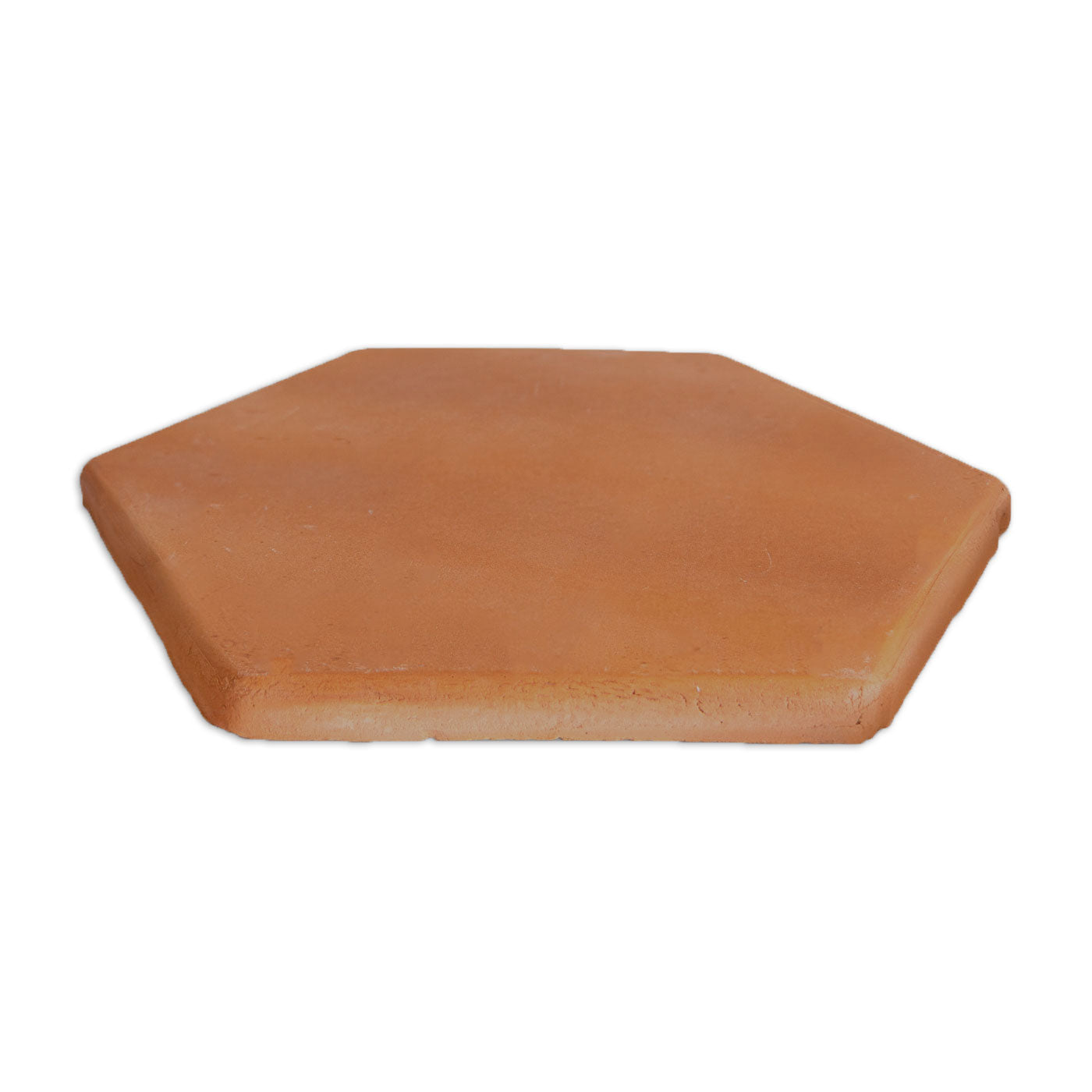Warm terracotta rounded hexagon tile by Clay Imports, featuring a soft texture and subtle rounded edges.