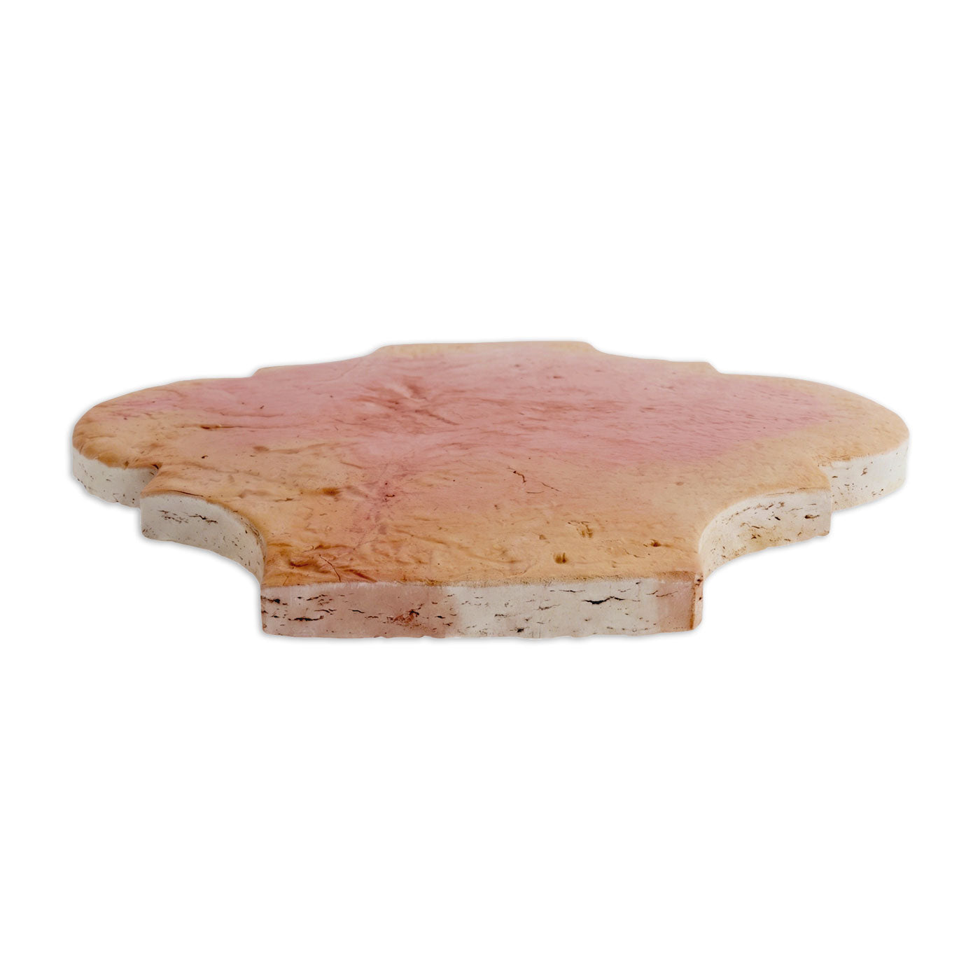 Terracotta tile with a reddish-pink and light brown satin finish by Clay Imports, in an ornate arabesque shape, shown at a slight angle.
