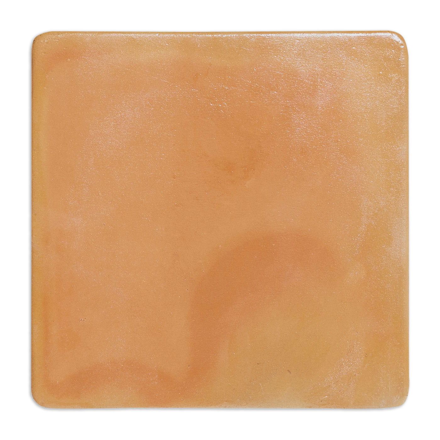 Rounded light reddish-brown clay tile sample by Clay Imports with subtle tonal variations and a slightly textured surface.
