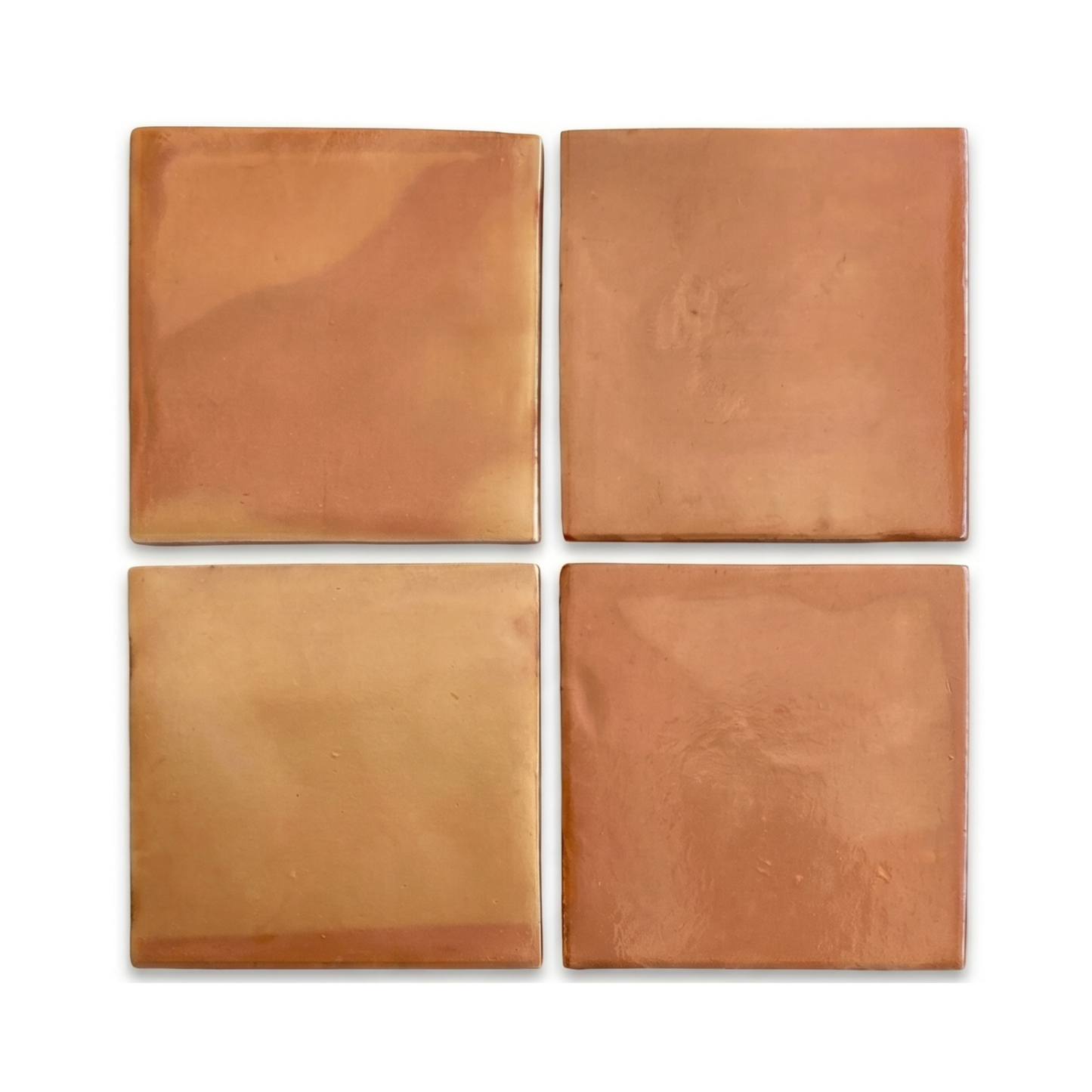 Four square terracotta tiles by Clay Imports, featuring warm, earthy tones and a rustic finish.