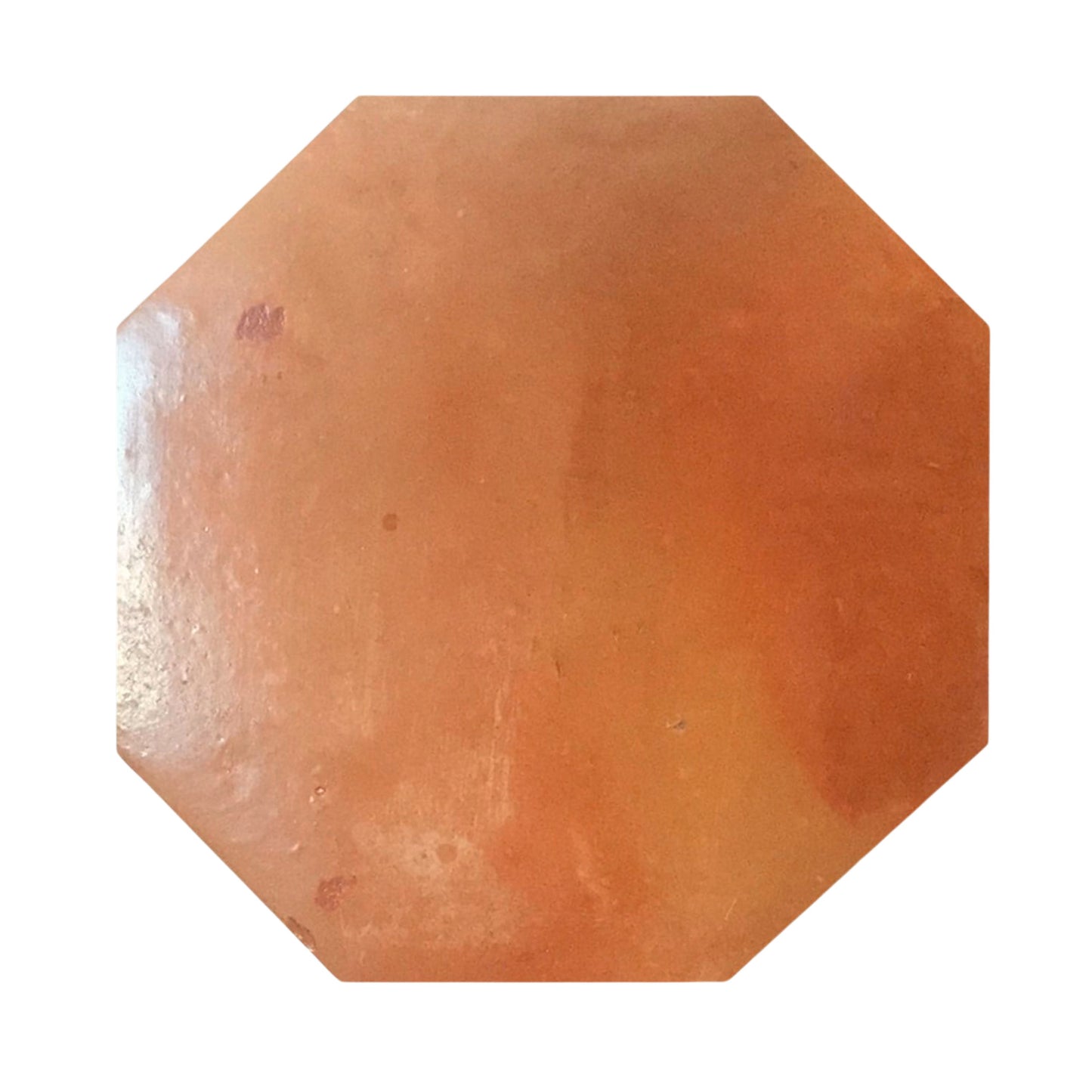 Octagon terracotta tile with a smooth, glossy finish from Clay Imports, featuring warm reddish-orange tones and natural imperfections.