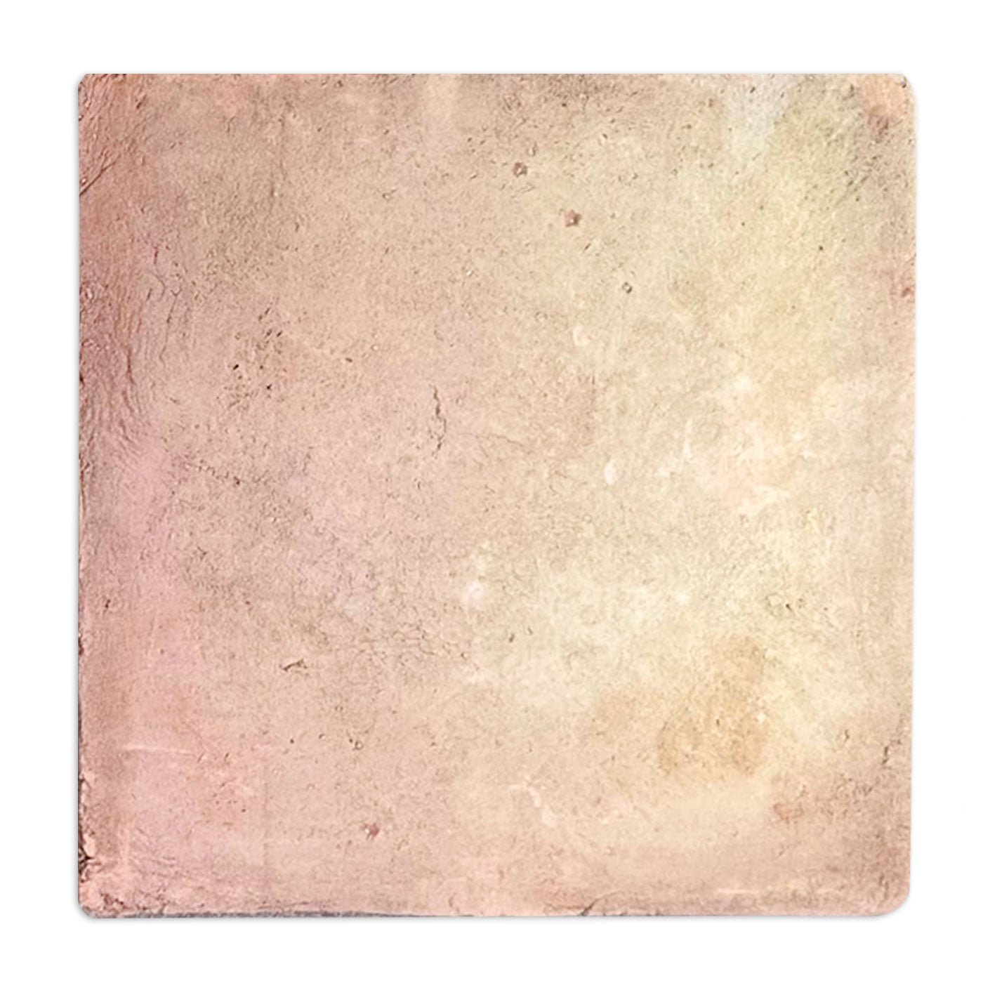 Rustic terracotta paver by Clay Imports Pavers with a rough, mottled surface in warm, transitioning earthy tones.