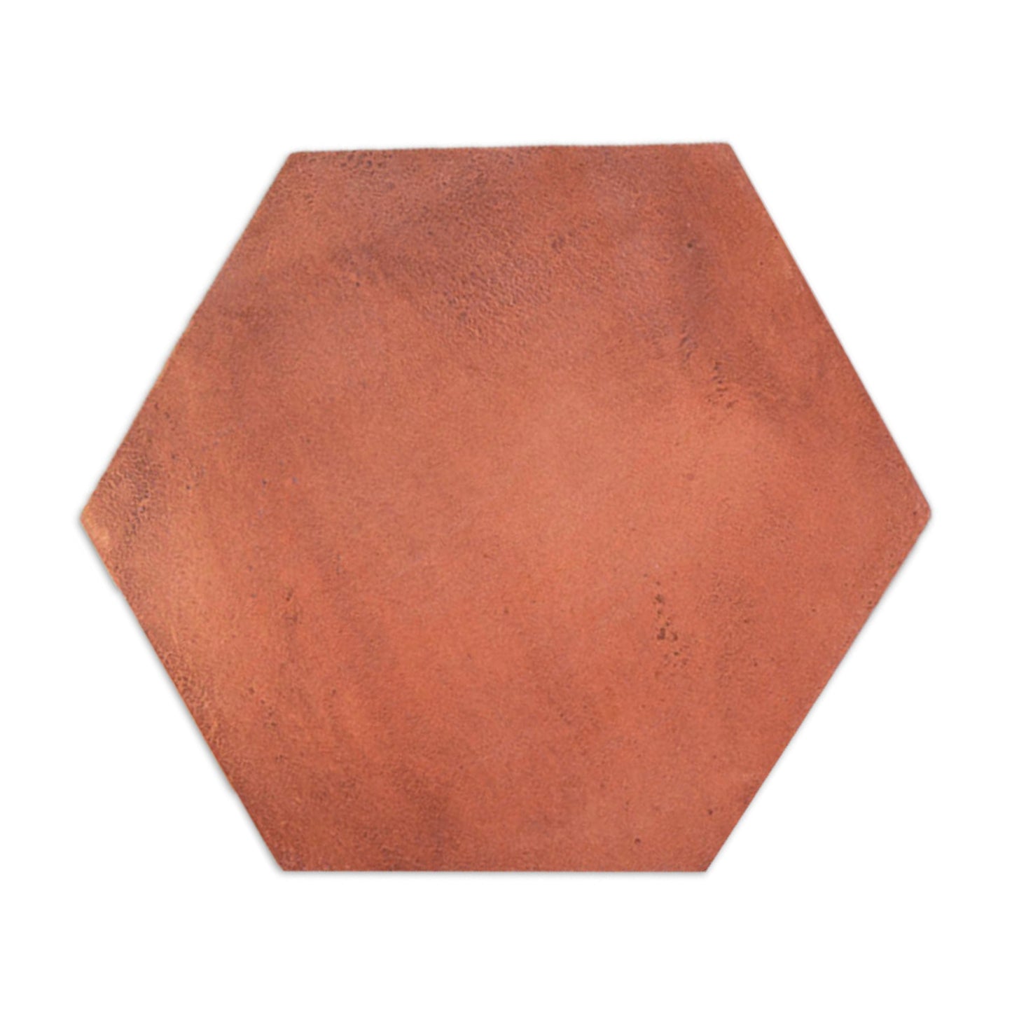 Reddish-brown Cotto Tierra Hexagon tile sample by Clay Imports, with a textured surface.