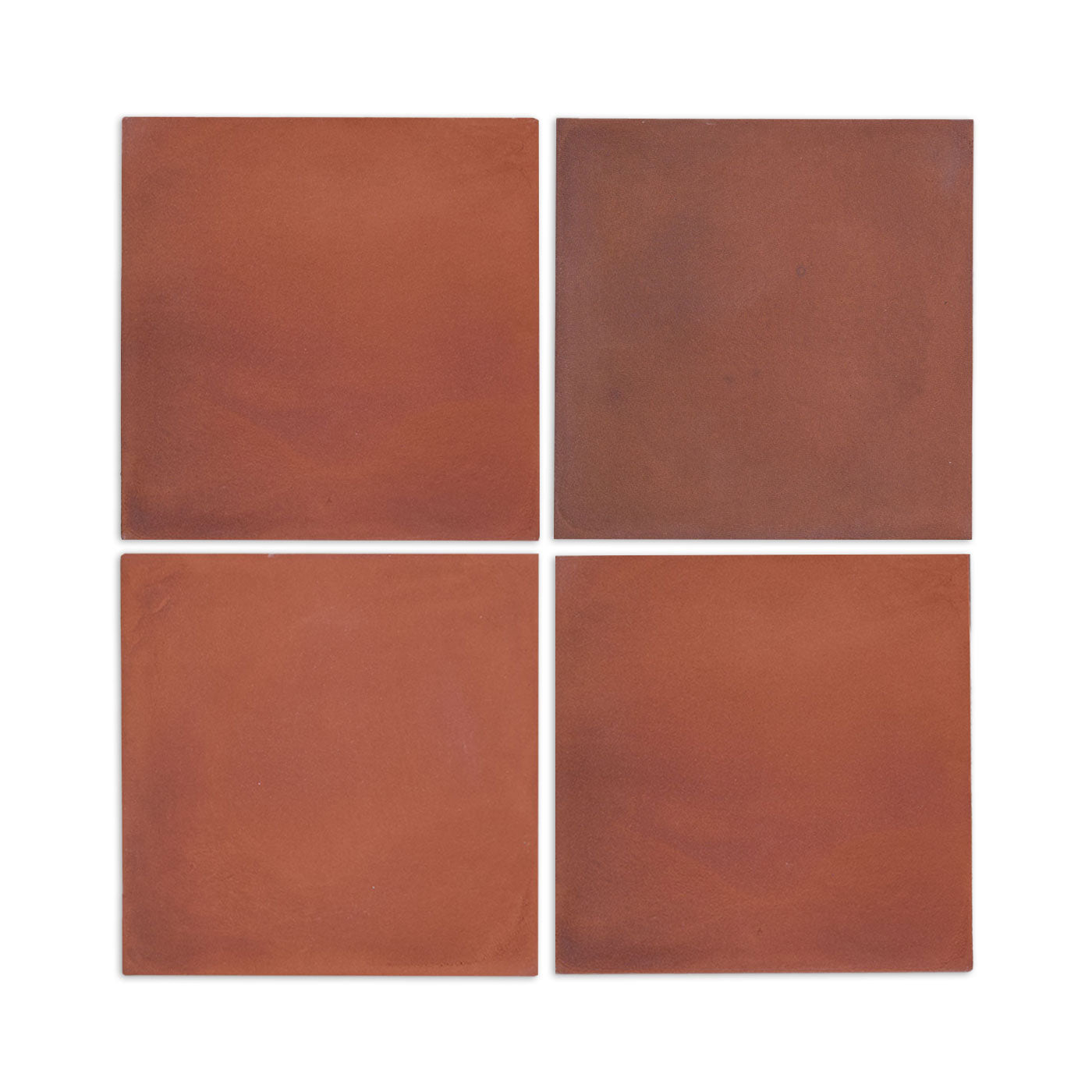 Set of four square terracotta tile samples by Clay Imports, showing variations in reddish-brown tone.