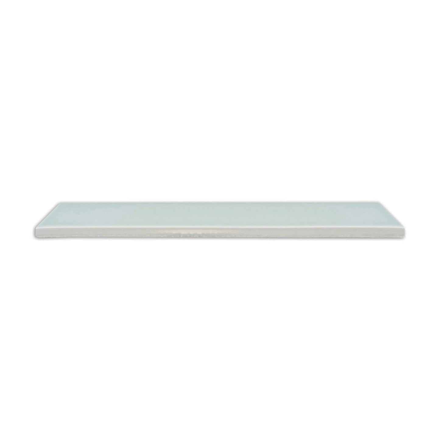 Glossy light aqua solid tile by Clay Imports, 2x12 inches, viewed from a side angle.