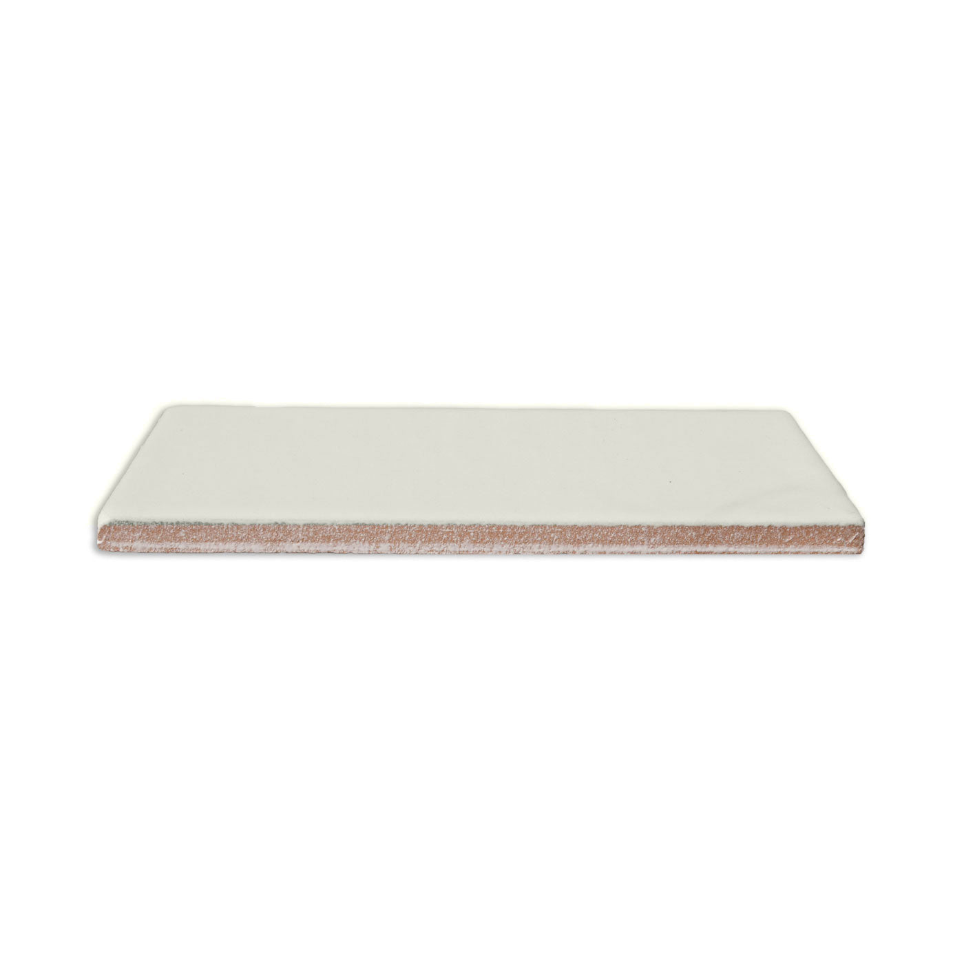 Concha 2x6 Solid Tile by Clay Imports, featuring a smooth off-white glaze over a reddish-brown unglazed body.