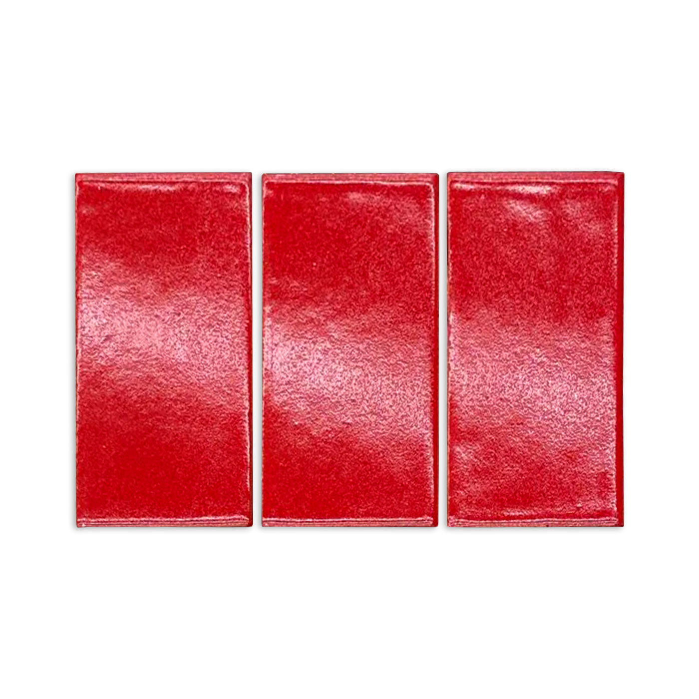 Poppy Gloss tile sample by Clay Imports, three rectangular pieces with a textured, glossy finish.