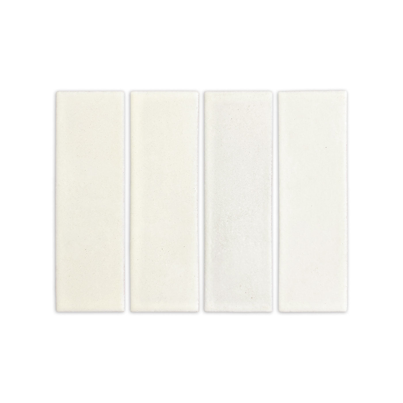 Four off-white rectangular sample tiles by Clay Imports, showing subtle variations in color and speckled texture.