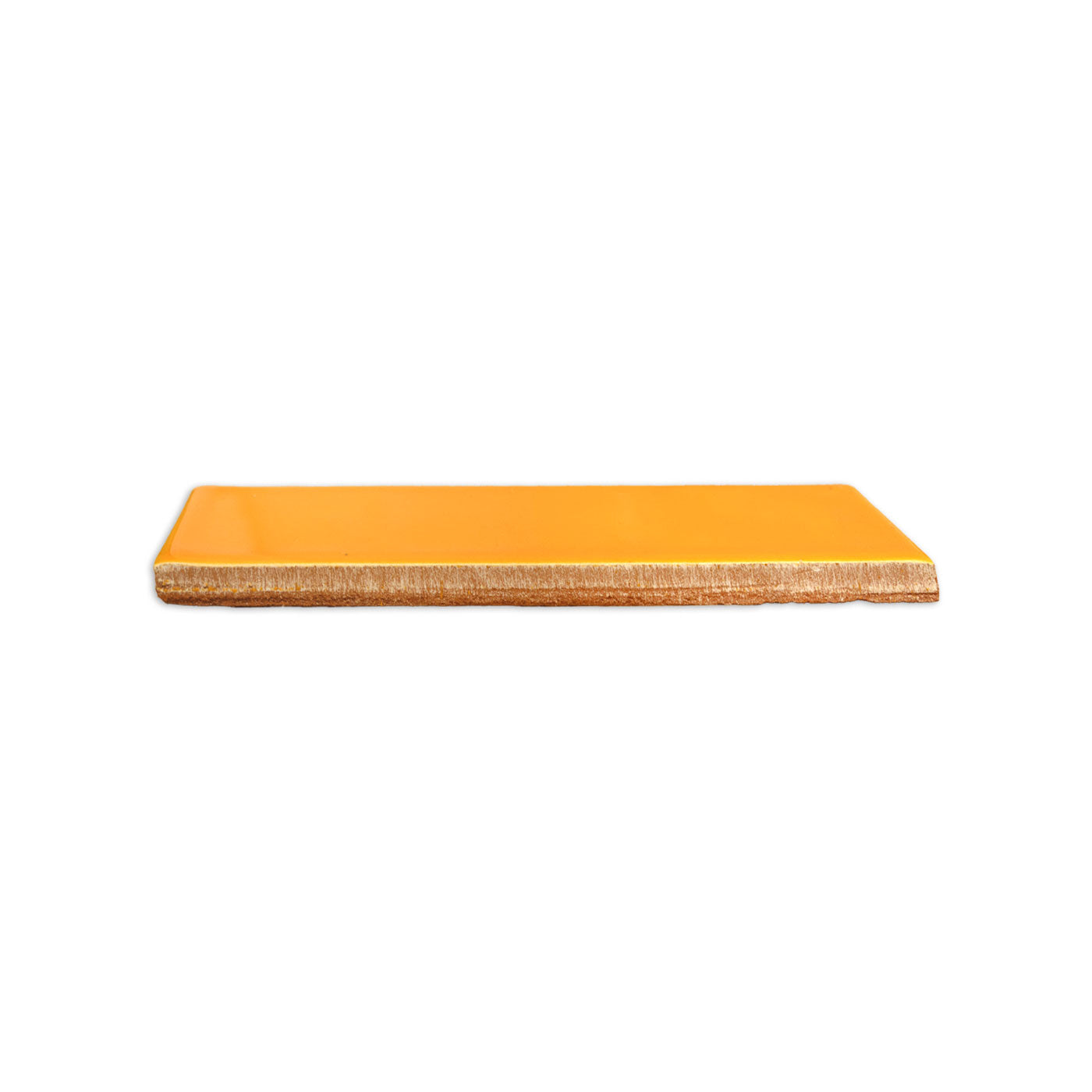 Marigold Solid Tile by Clay Imports, a glossy bright orange rectangular tile with an unglazed, earthy side.