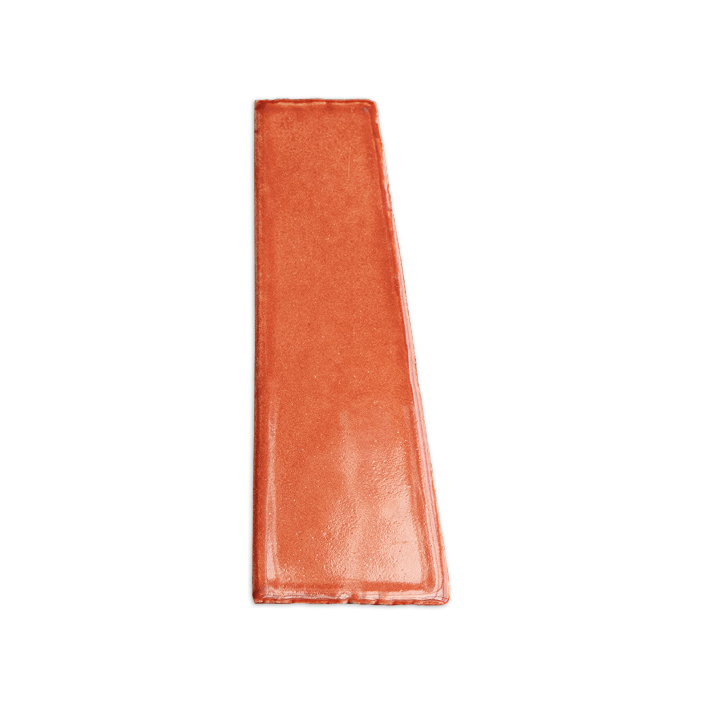 Reddish-orange Sample Trumpet Brandy 2x6 tile by Clay Imports, featuring a textured surface and slightly uneven edges.