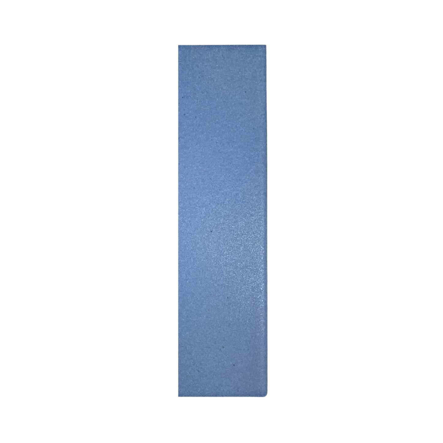 Denim blue 2x8 tile sample by Clay Imports, showing a speckled texture on a rectangular piece.