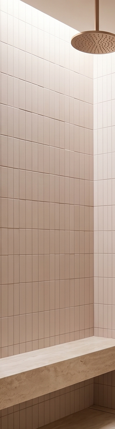 Rosado Desperado clay tiles by Clay Imports, rectangular and vertically stacked, lining a minimalist shower with a light bench.
