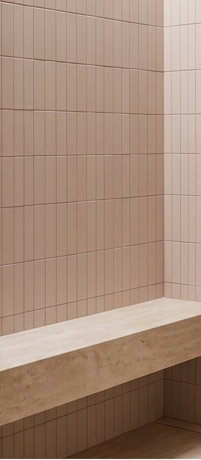 Rosado Desperado clay tiles by Clay Imports, rectangular and vertically stacked, lining a minimalist shower with a light bench.