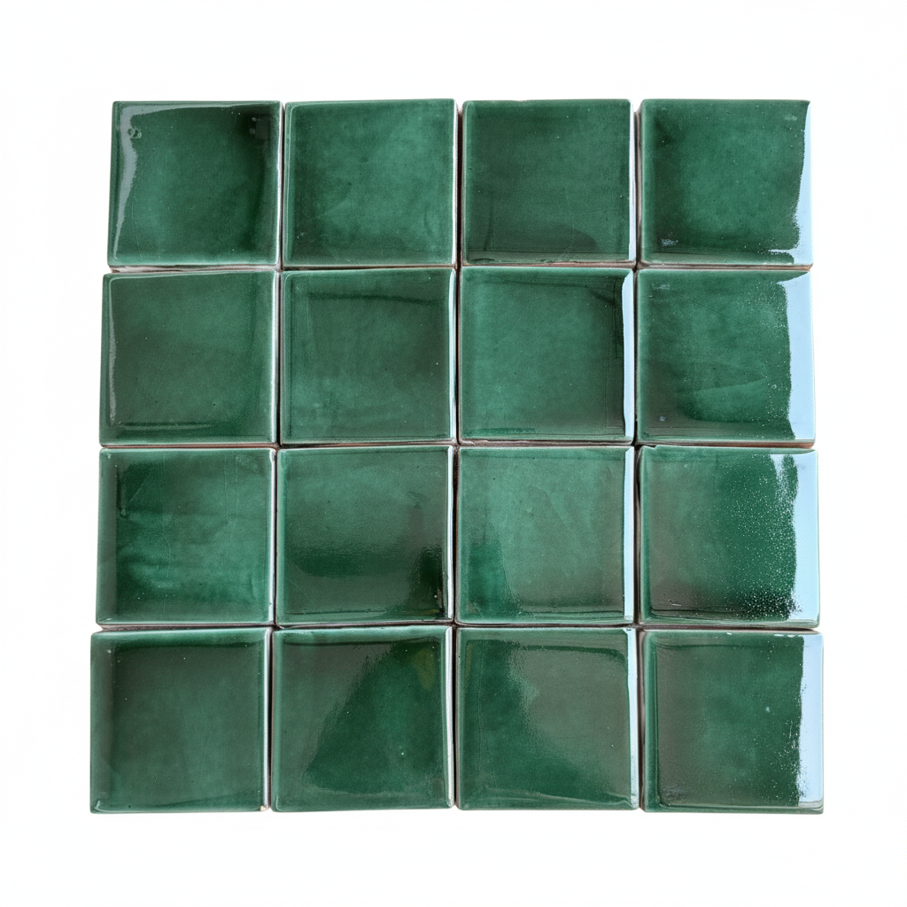 A grid of sixteen forest green ceramic tile samples by Clay Imports, arranged in a 4x4 grid with a glossy, handcrafted texture.