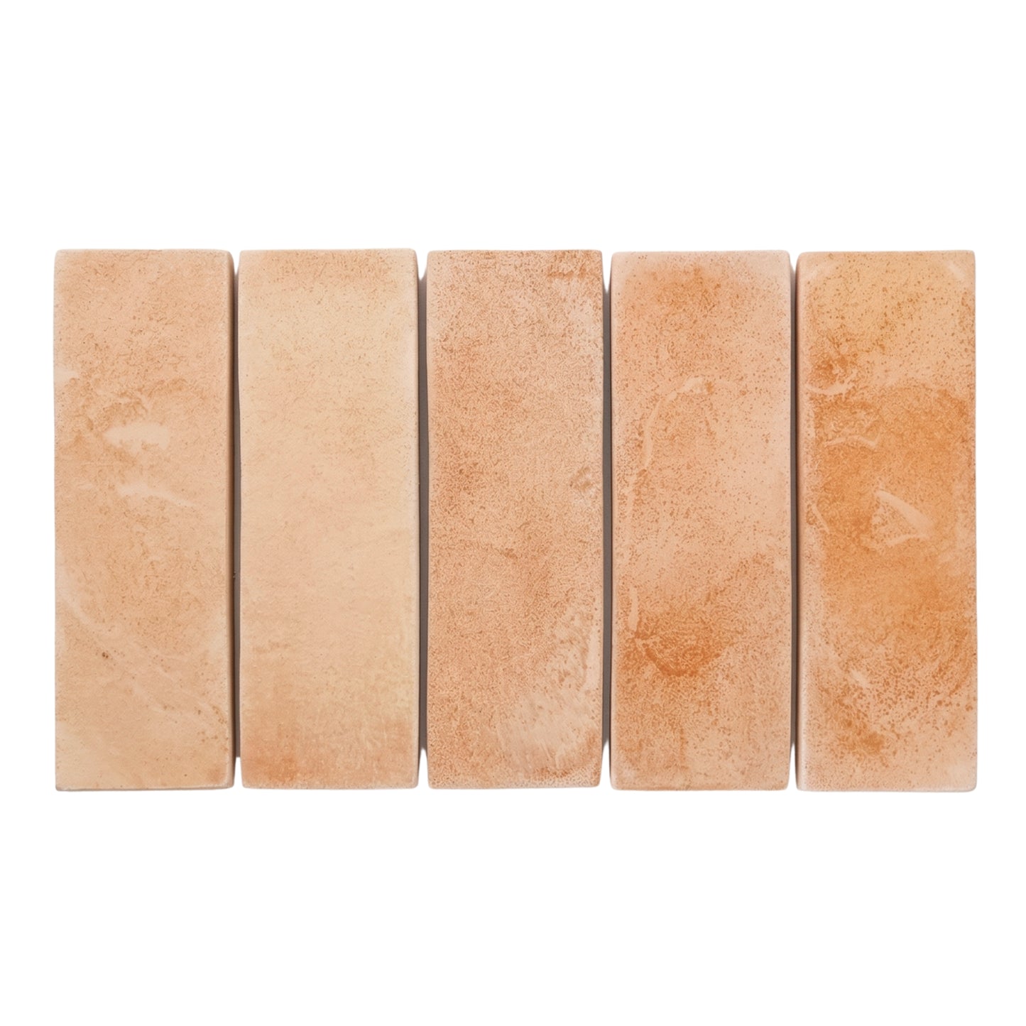 Matte terracotta rectangular tiles by Clay Imports, five pieces displaying a natural reddish-brown color and speckled texture.