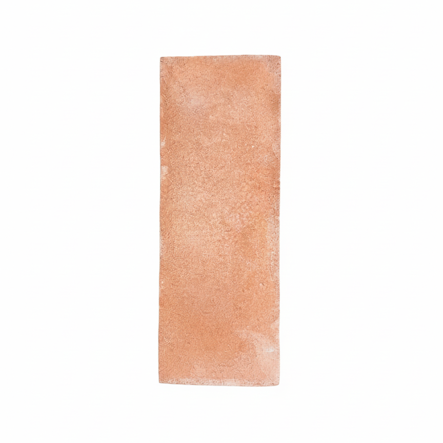 Matte terracotta sample tile by Clay Imports with a sandy, speckled texture.