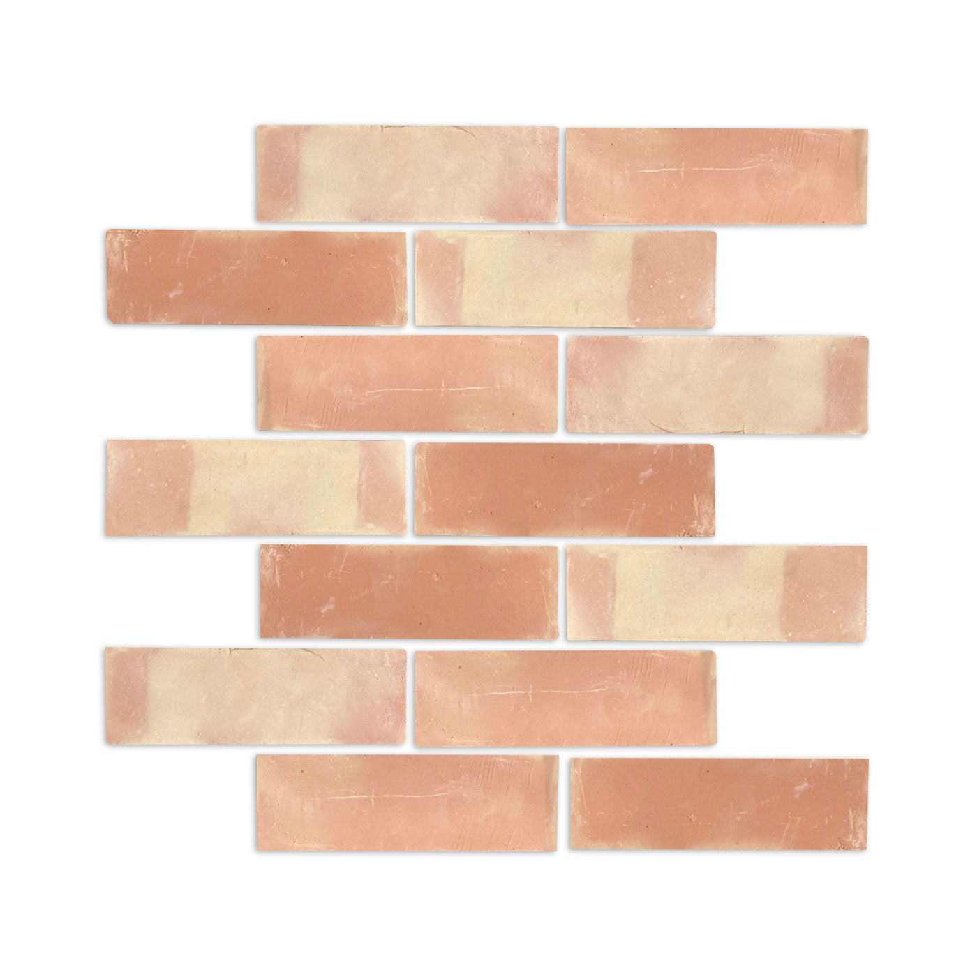 Smooth matte pale orange and cream brick samples by Clay Imports, laid in a staggered pattern, showcasing varied tones and subtle textures.