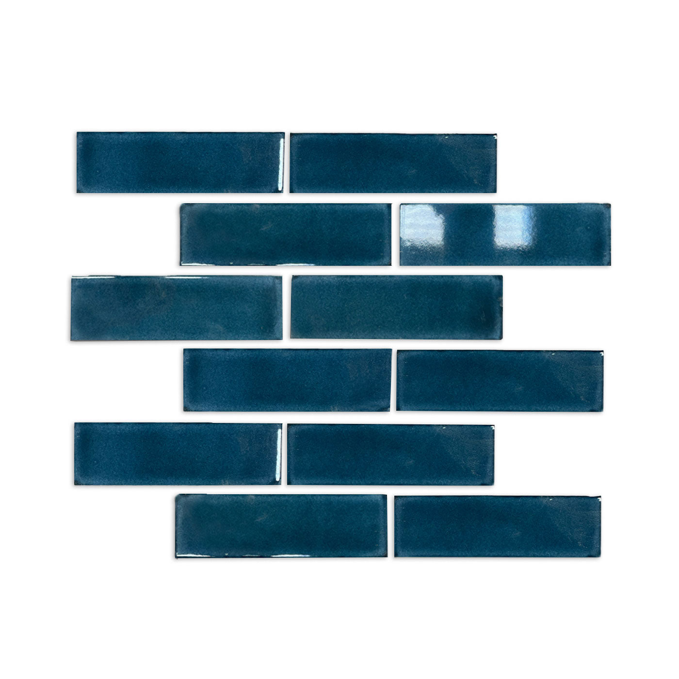 Dark teal rectangular solid tile by Clay Imports, arranged in an offset pattern with a glossy, handcrafted finish.
