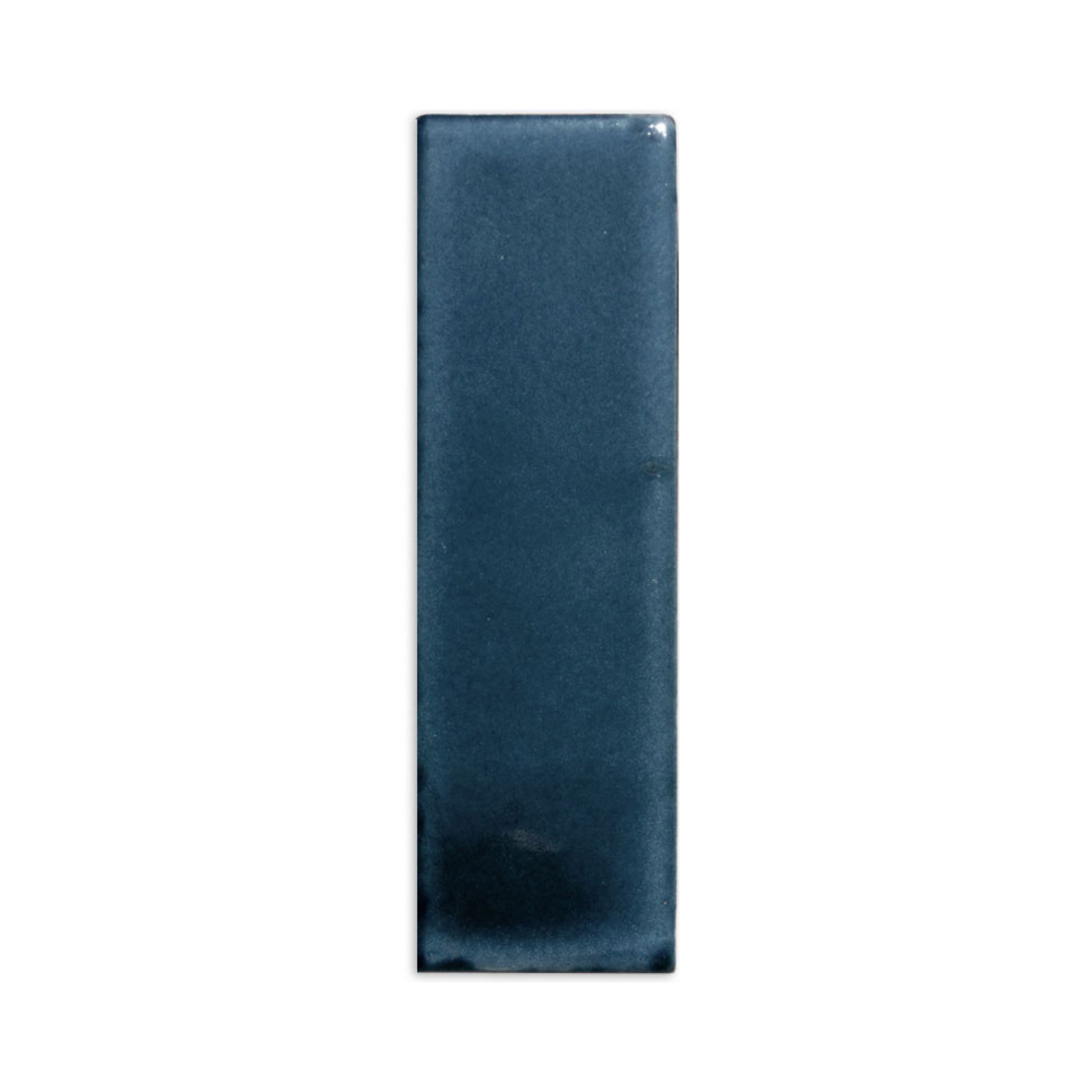 Dark blue Rio 2x6 sample tile by Clay Imports with a glossy, textured surface and subtle imperfections.