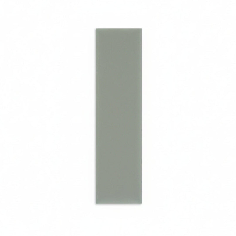Hot Spring 2x8 tile sample by Clay Imports, in a muted green-gray with a smooth finish.