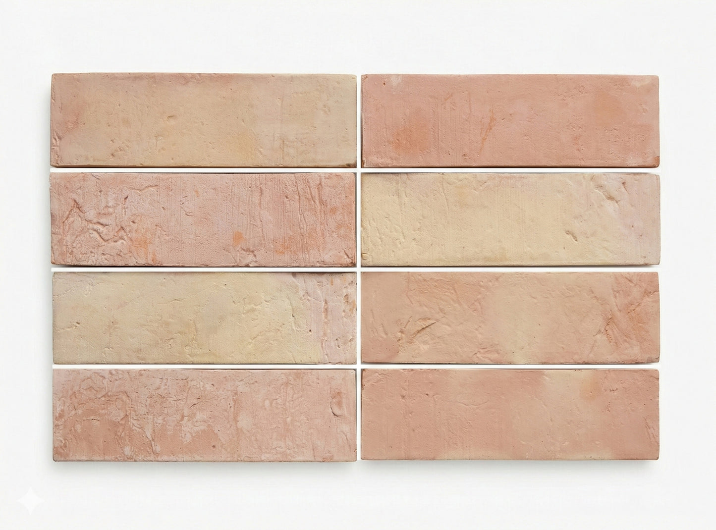 Antique Matte Thin Bricks by Clay Imports in varied pale pink and cream terracotta with rustic, textured surfaces.