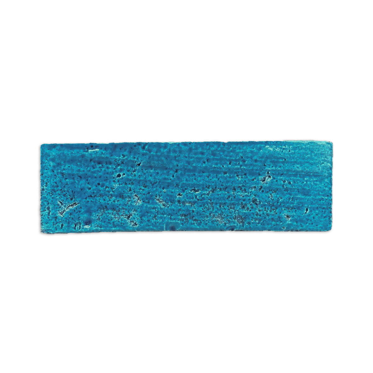 Lagoon blue-green glazed thin brick by Clay Imports with a textured, porous surface.