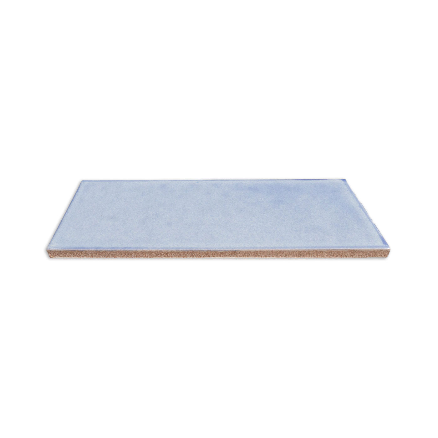 Light blue rectangular solid tile by Clay Imports with a terracotta edge, viewed from an angle.