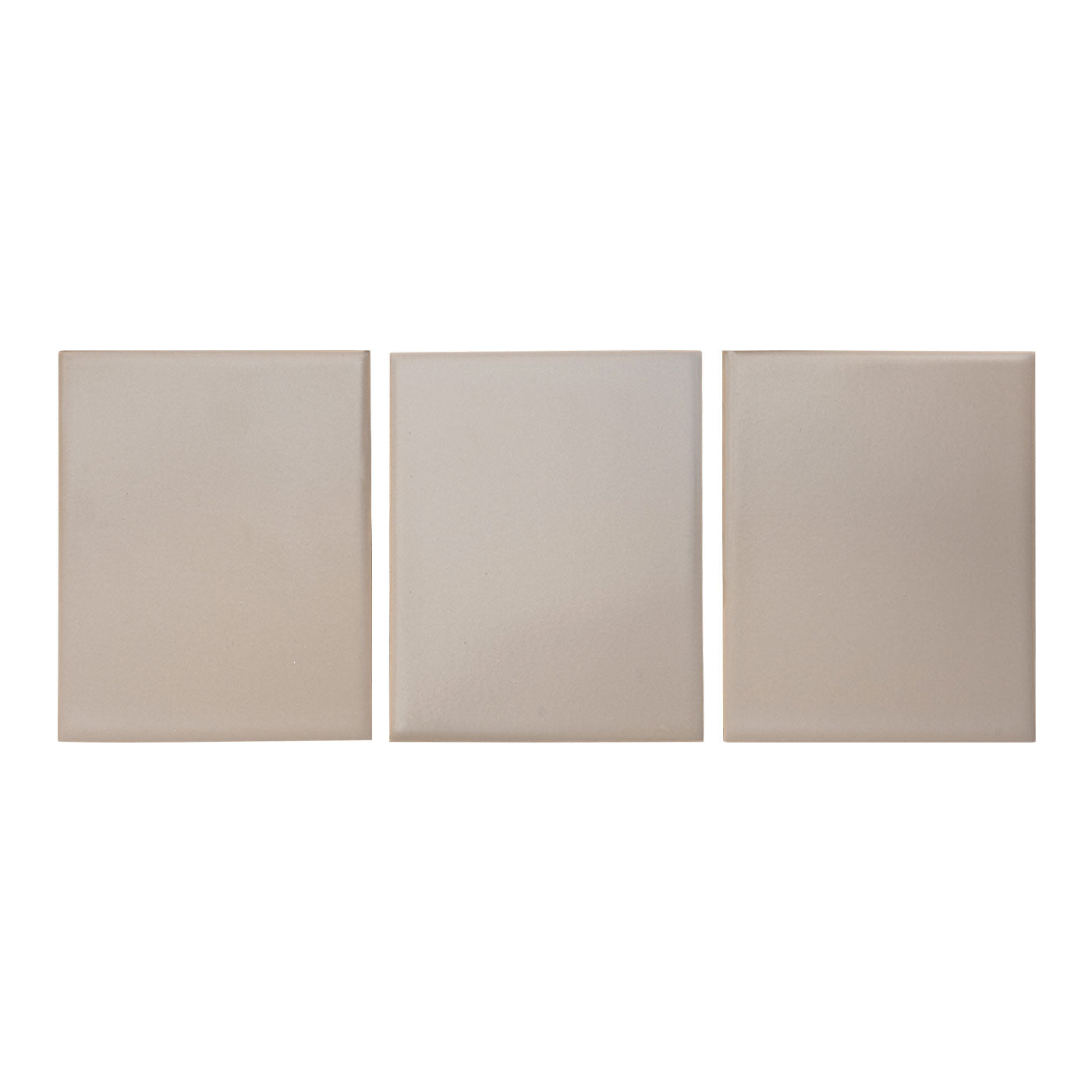 Three Palo Santo matte sample tiles by Clay Imports in a light beige-taupe color, arranged horizontally.