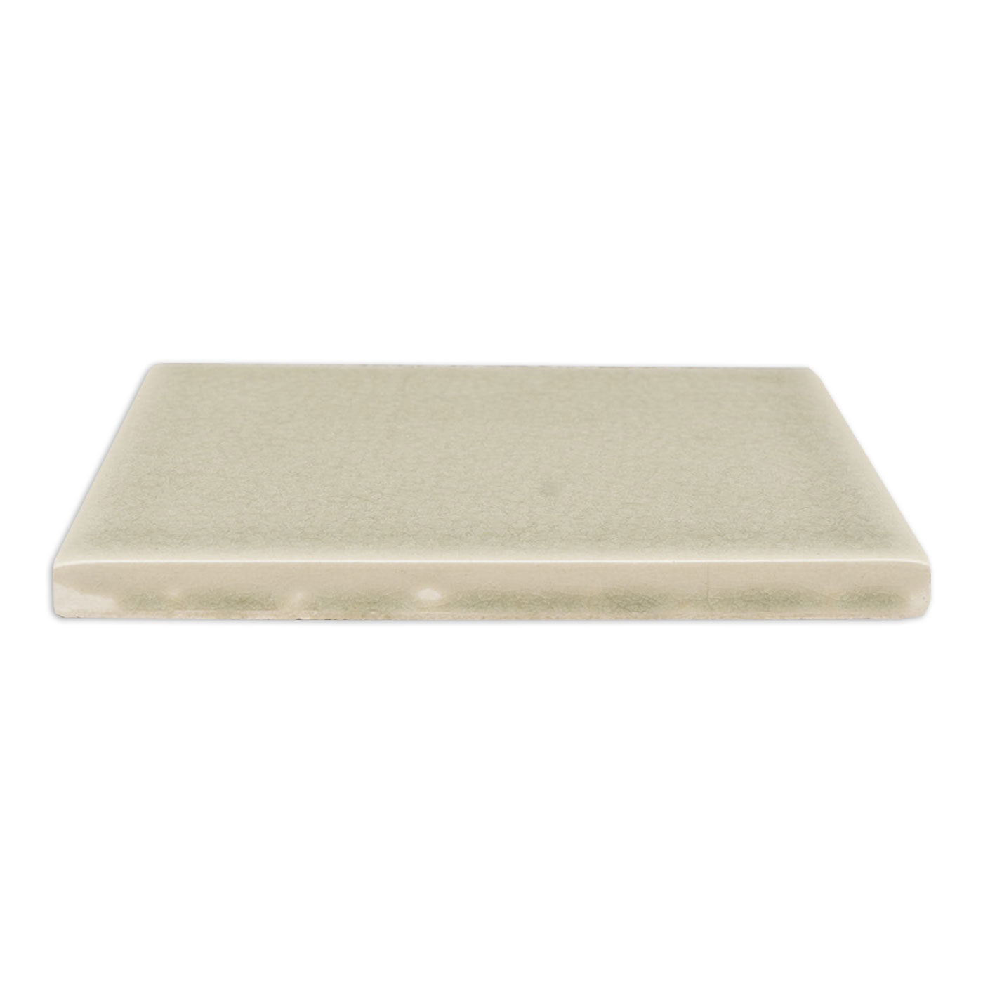 Pale green crackle gloss solid tile by Clay Imports, showing its textured surface and unglazed light-colored side.