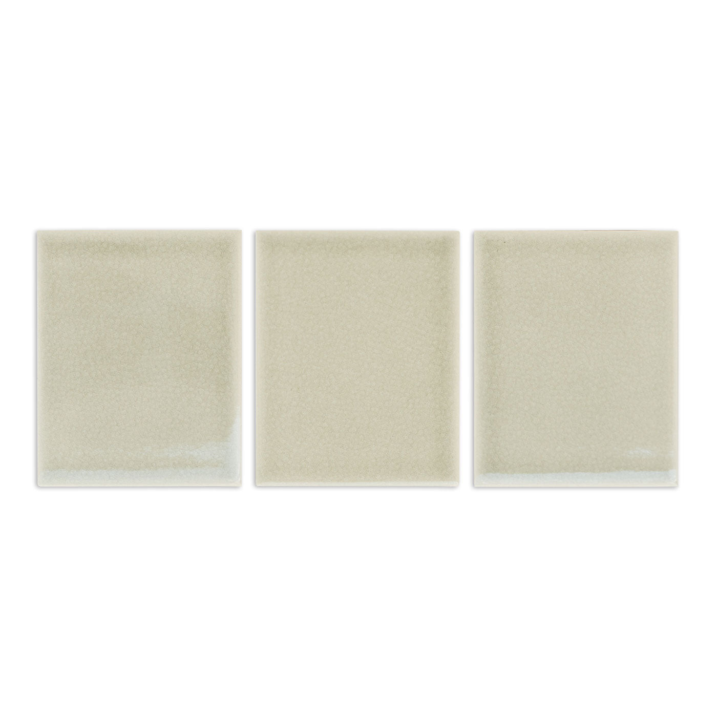 Three Yucca crackle gloss tile samples by Clay Imports, arranged in a row.