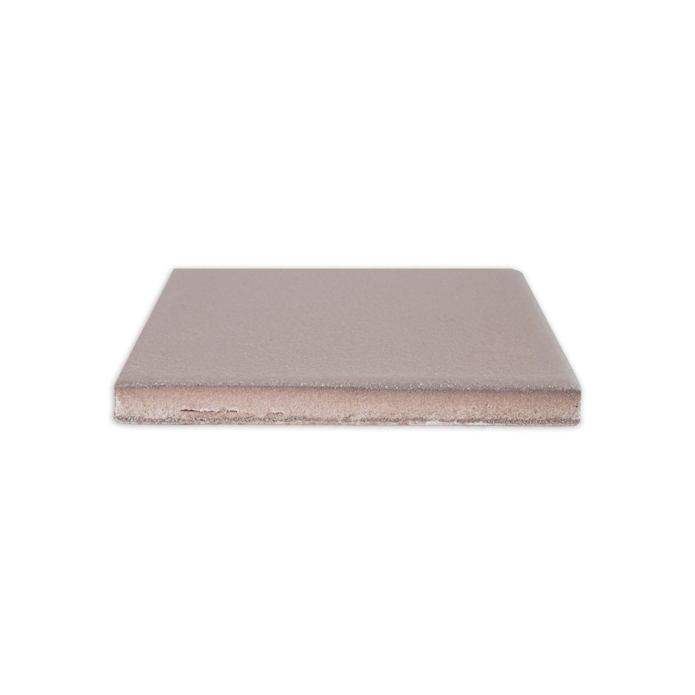 Brown clay tile by Clay Imports, shown from the side revealing its layered, textured finish.