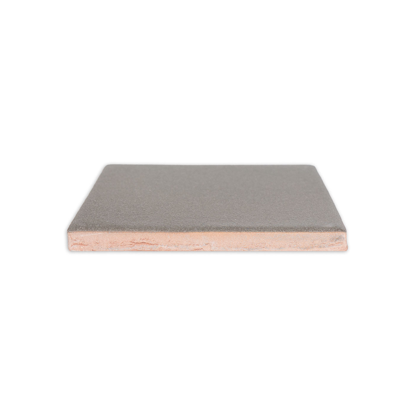 Green clay tile by Clay Imports, showing a textured gray-green surface over a reddish-pink base in a side view.