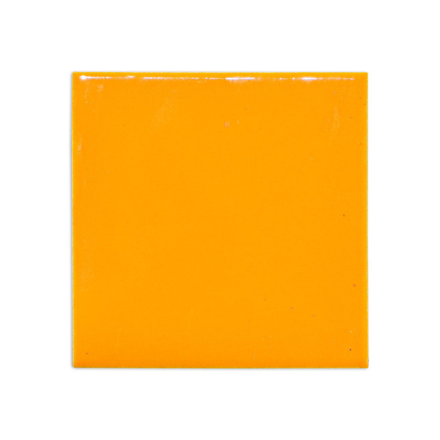 Marigold square tile sample by Clay Imports with a glossy finish and minor surface texture, on a white background.