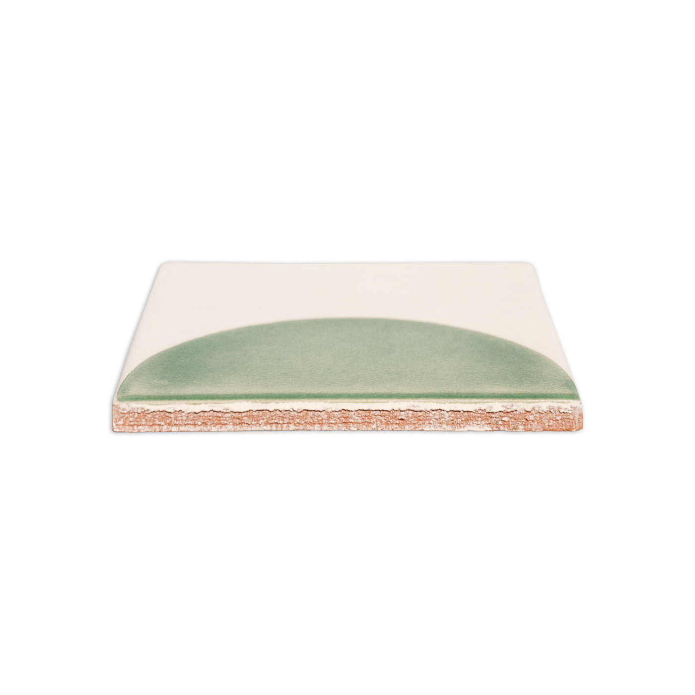 Square solid tile with a green semi-circle on beige by Clay Imports, showing its rough terracotta side.
