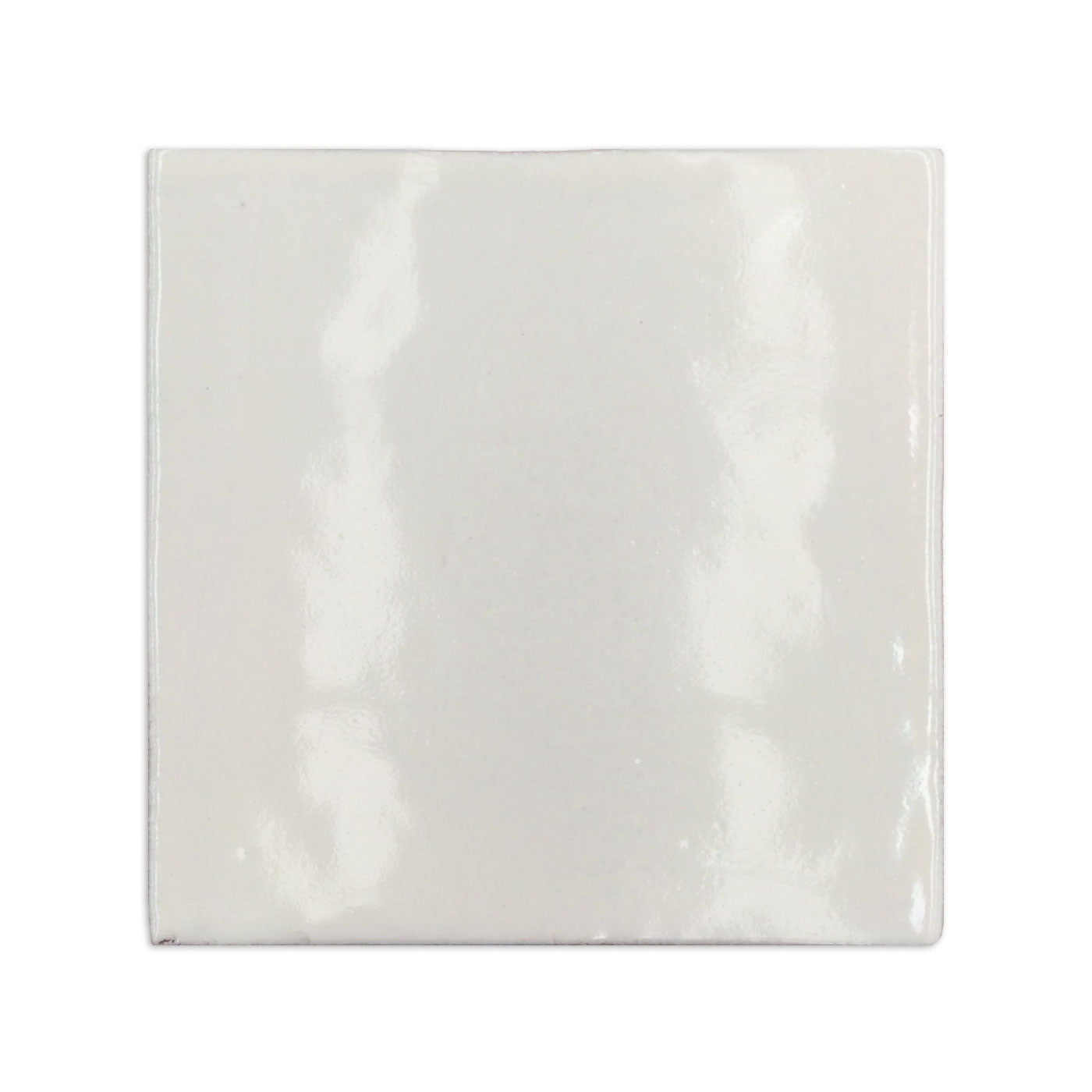 Square champagne glazed cotto tile sample by Clay Imports, with a glossy finish and subtly irregular edges.