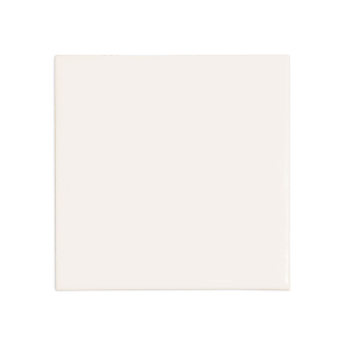 Off-white, glossy Fossil Gloss 4x4 square sample tile by Clay Imports.