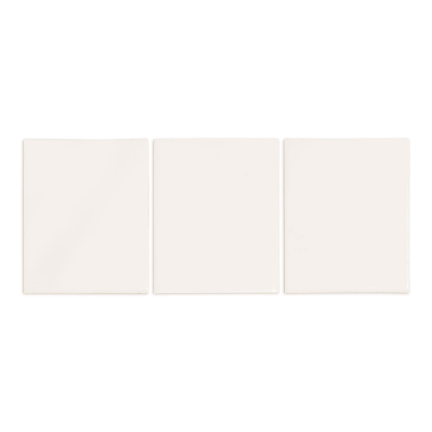 Three light beige gloss solid tiles by Clay Imports, arranged horizontally on a white background.