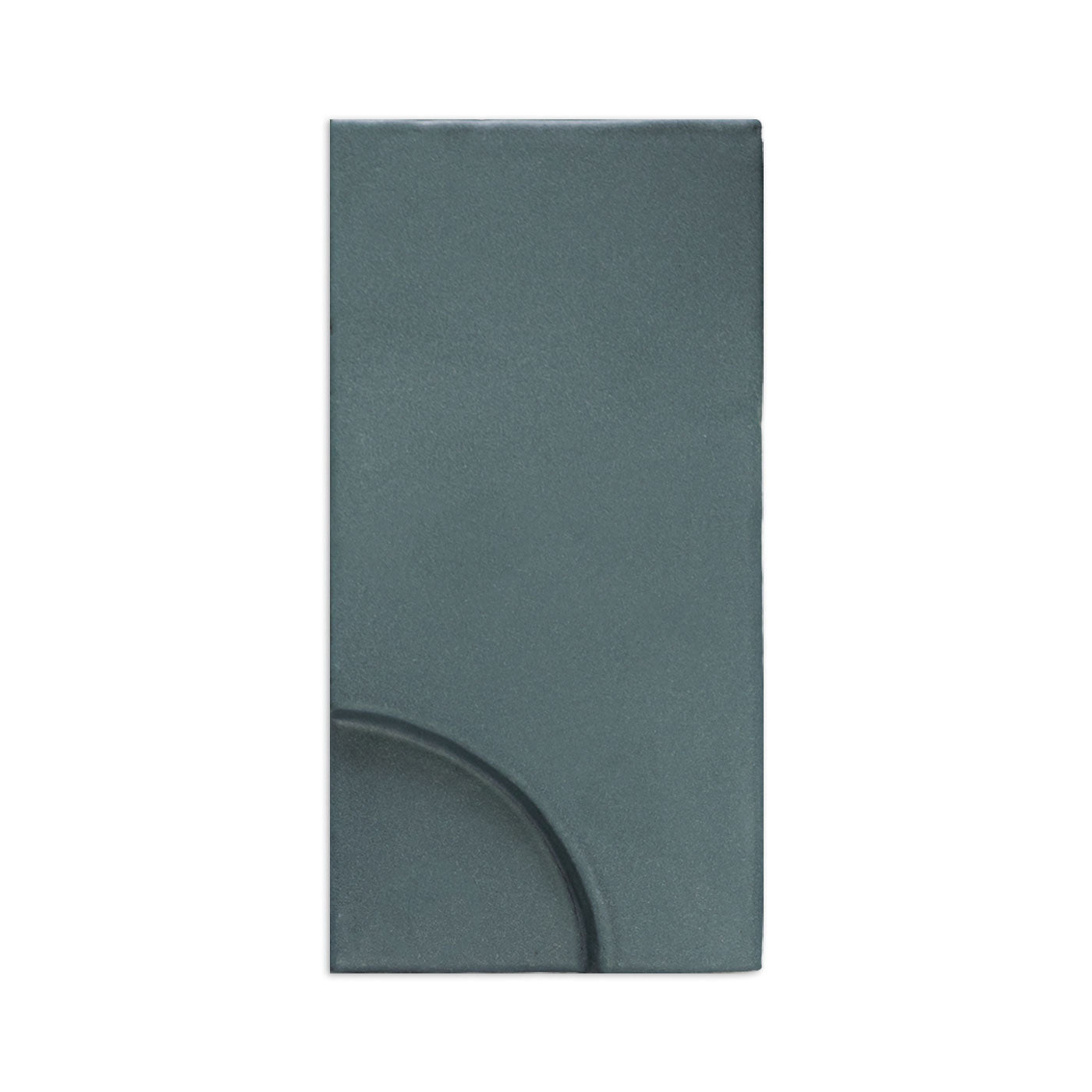 Dark greenish-grey rectangular tile sample by Clay Imports with a raised quarter-circle design.