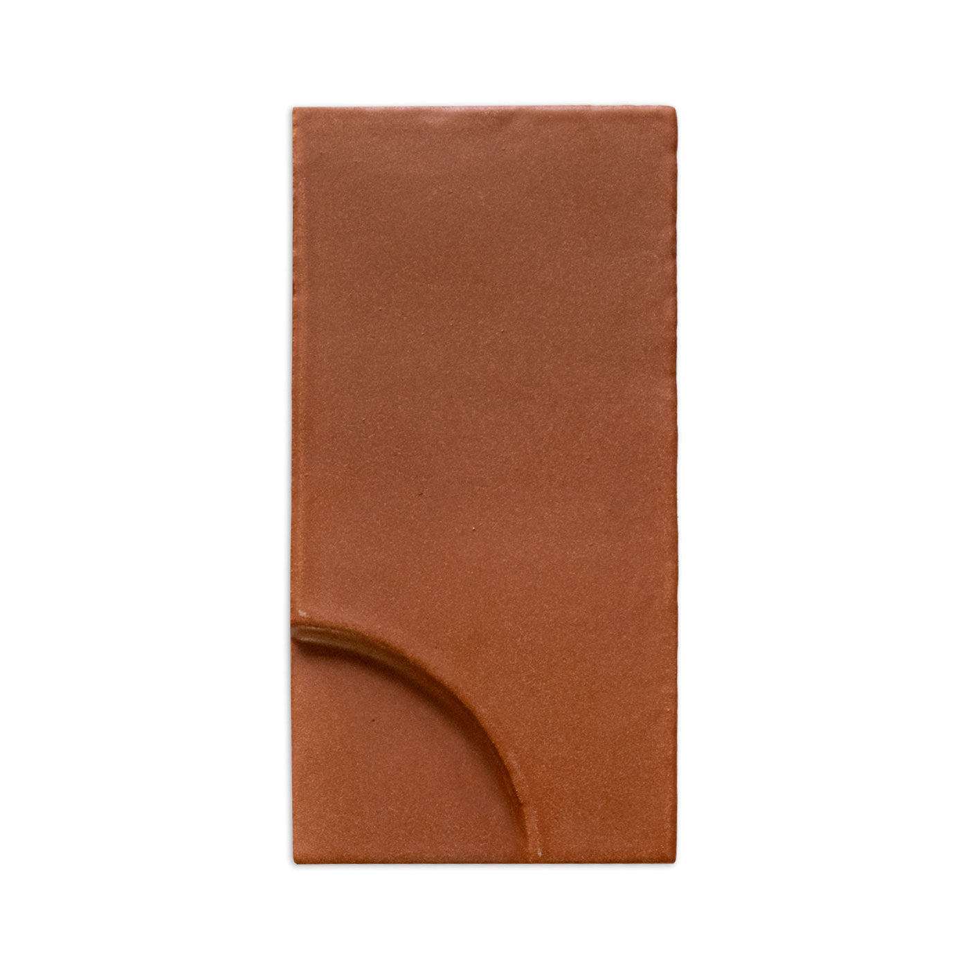 Rectangular Mamey terracotta sample tile by Clay Imports, featuring a raised quarter-circle design on the bottom left.