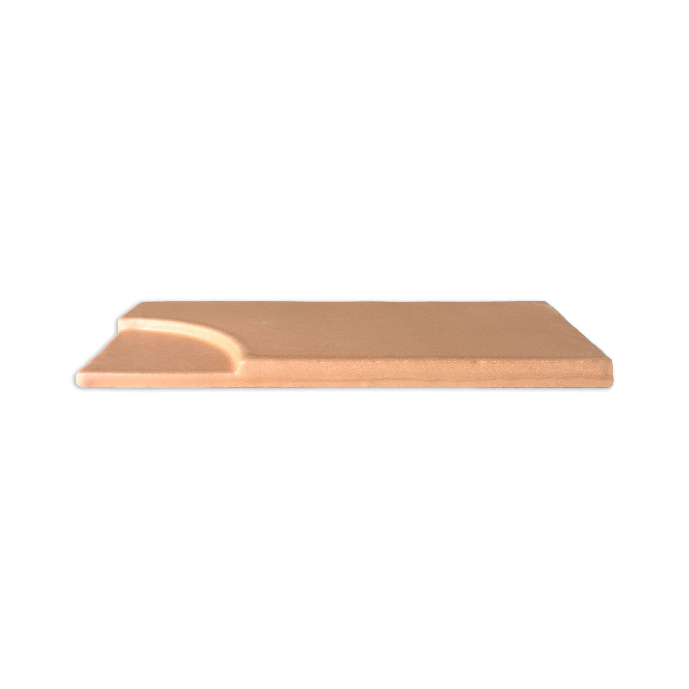 Tan terracotta tile by Clay Imports featuring a curved indentation on one end, side view.
