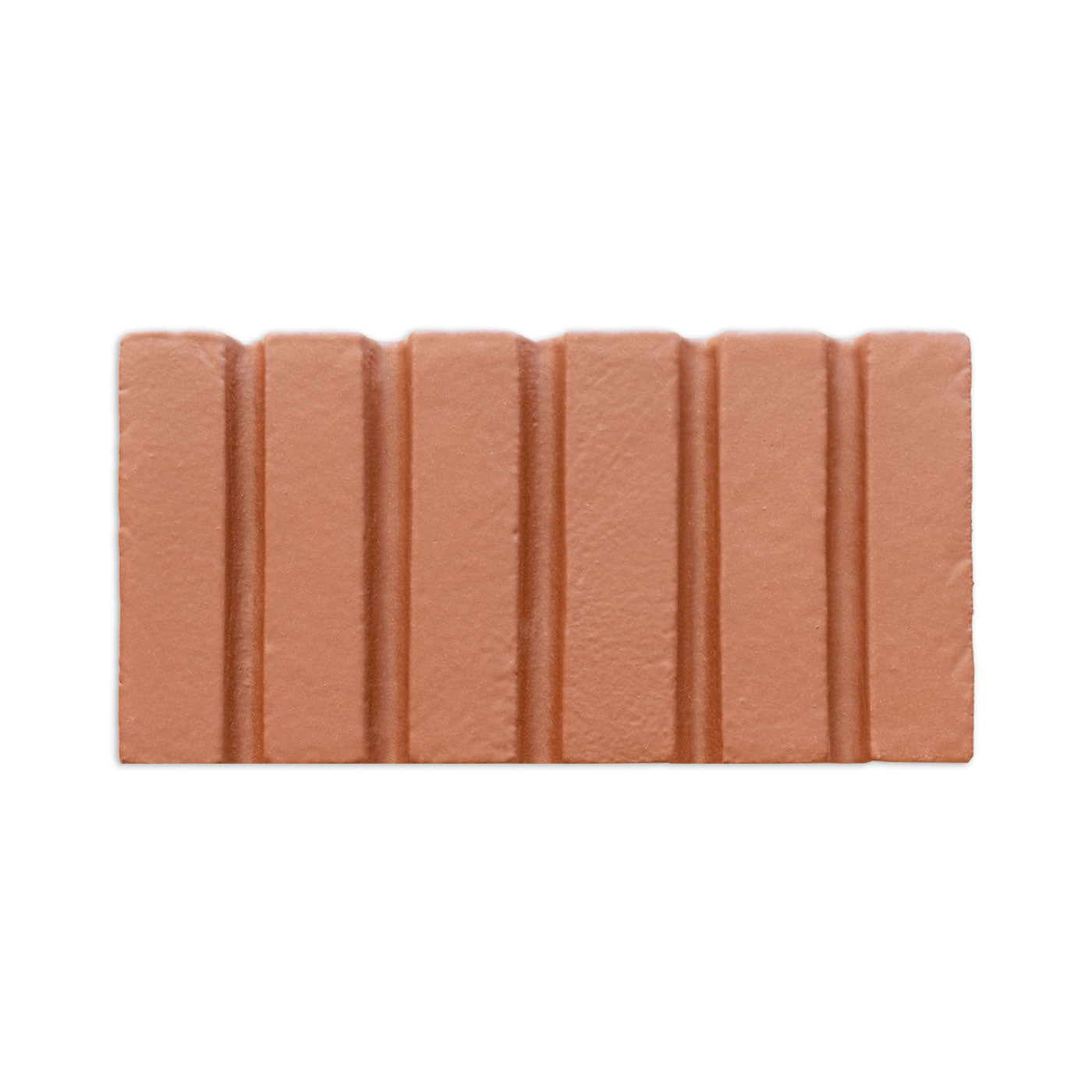 Mamey-colored sample brick by Clay Imports featuring a fluted texture with seven vertical ridges.