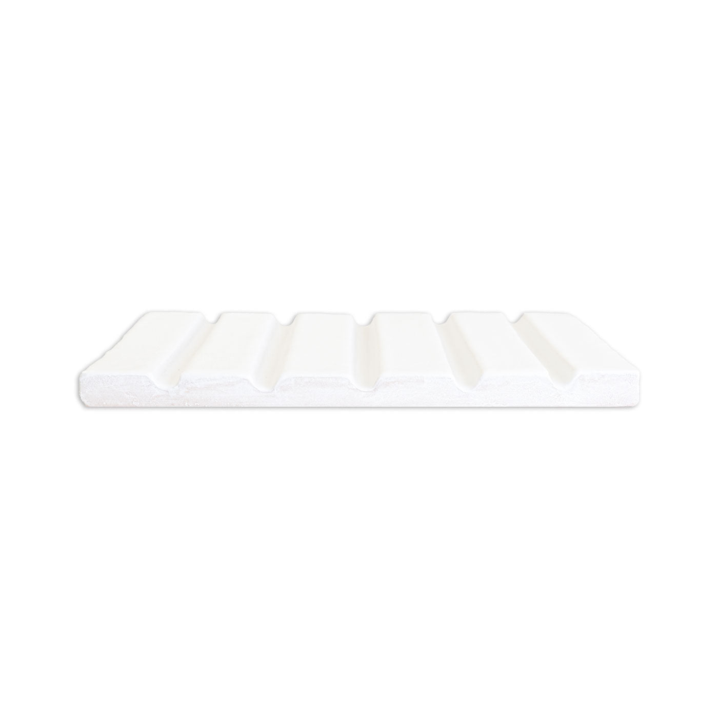 White ridged clay tile by Clay Imports, featuring a wavy top surface with five raised sections, viewed from the side.