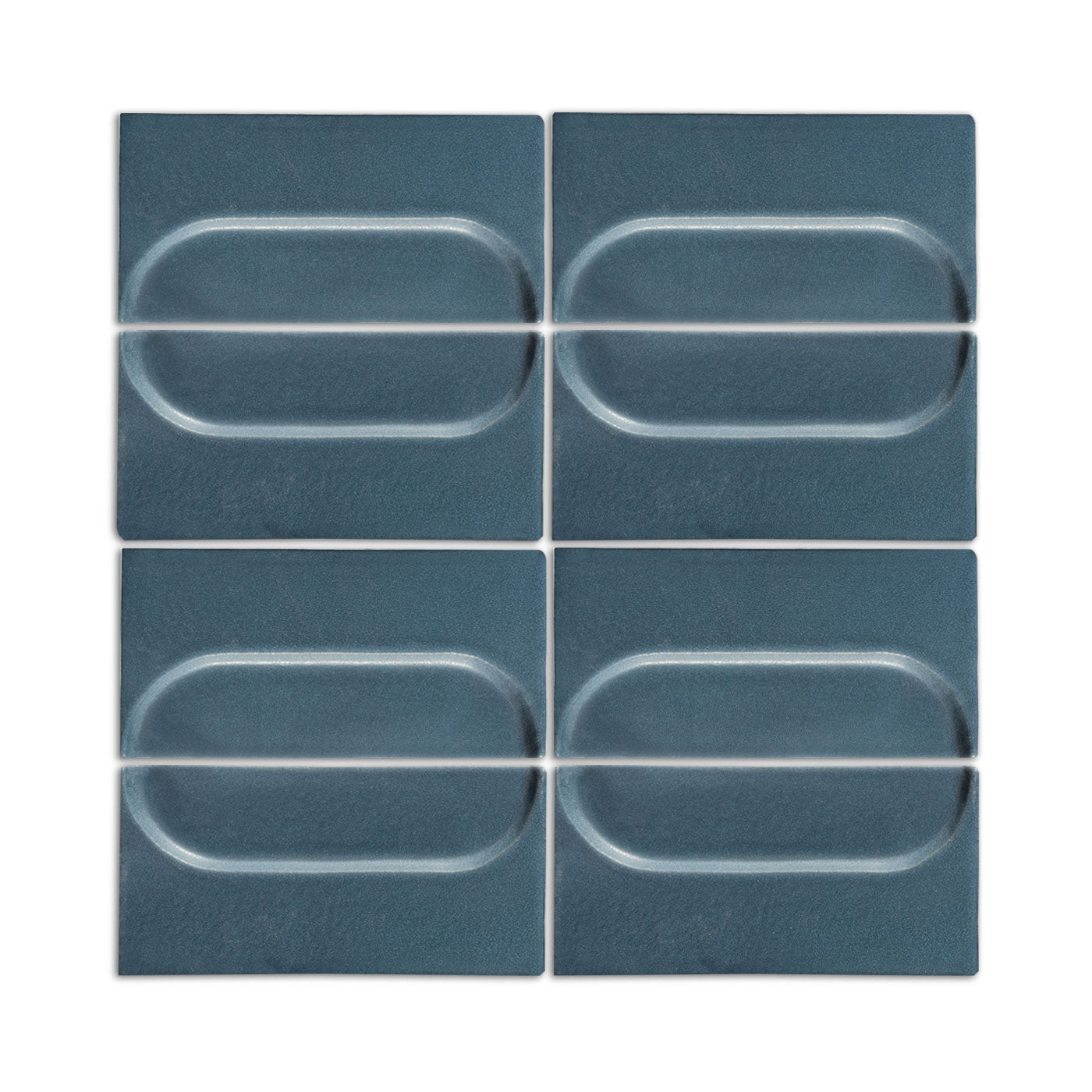 Four midnight blue oval tile samples by Clay Imports, showing raised oval designs on textured square tiles.