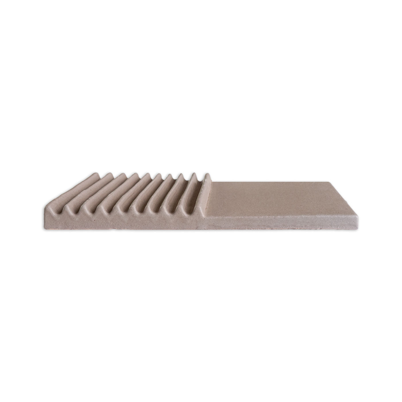 Brown Raya Boot clay shape by Clay Imports, with a wavy, ribbed side and a flat rectangular surface, side view.