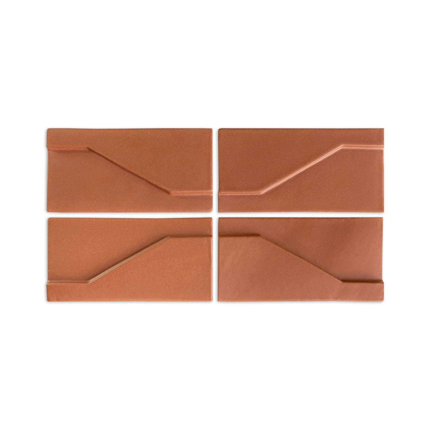 Four reddish-brown Templo Mamey tiles by Clay Imports, featuring recessed linear geometric patterns arranged in a grid.