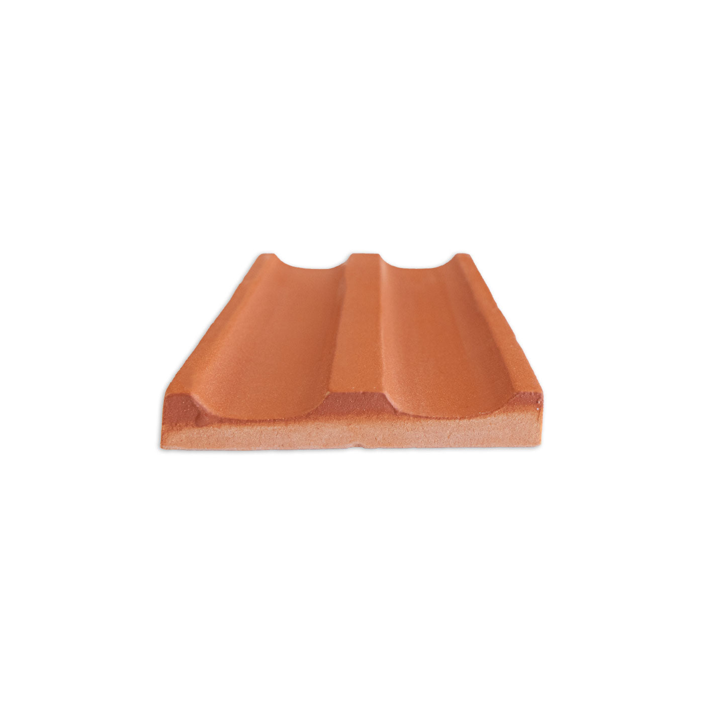 Terracotta-colored clay tile by Clay Imports with a distinct double-channel profile, viewed from the side.