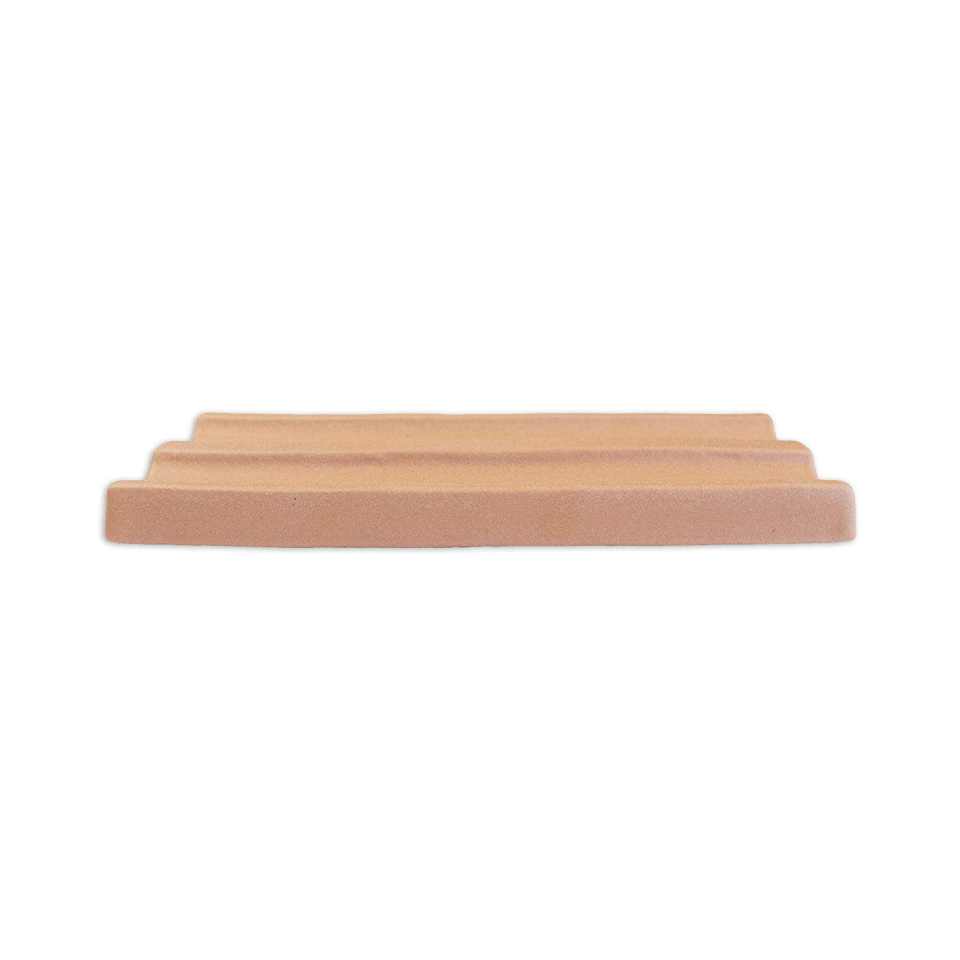 Light brown stepped clay tile by Clay Imports, viewed horizontally with a ridged profile.