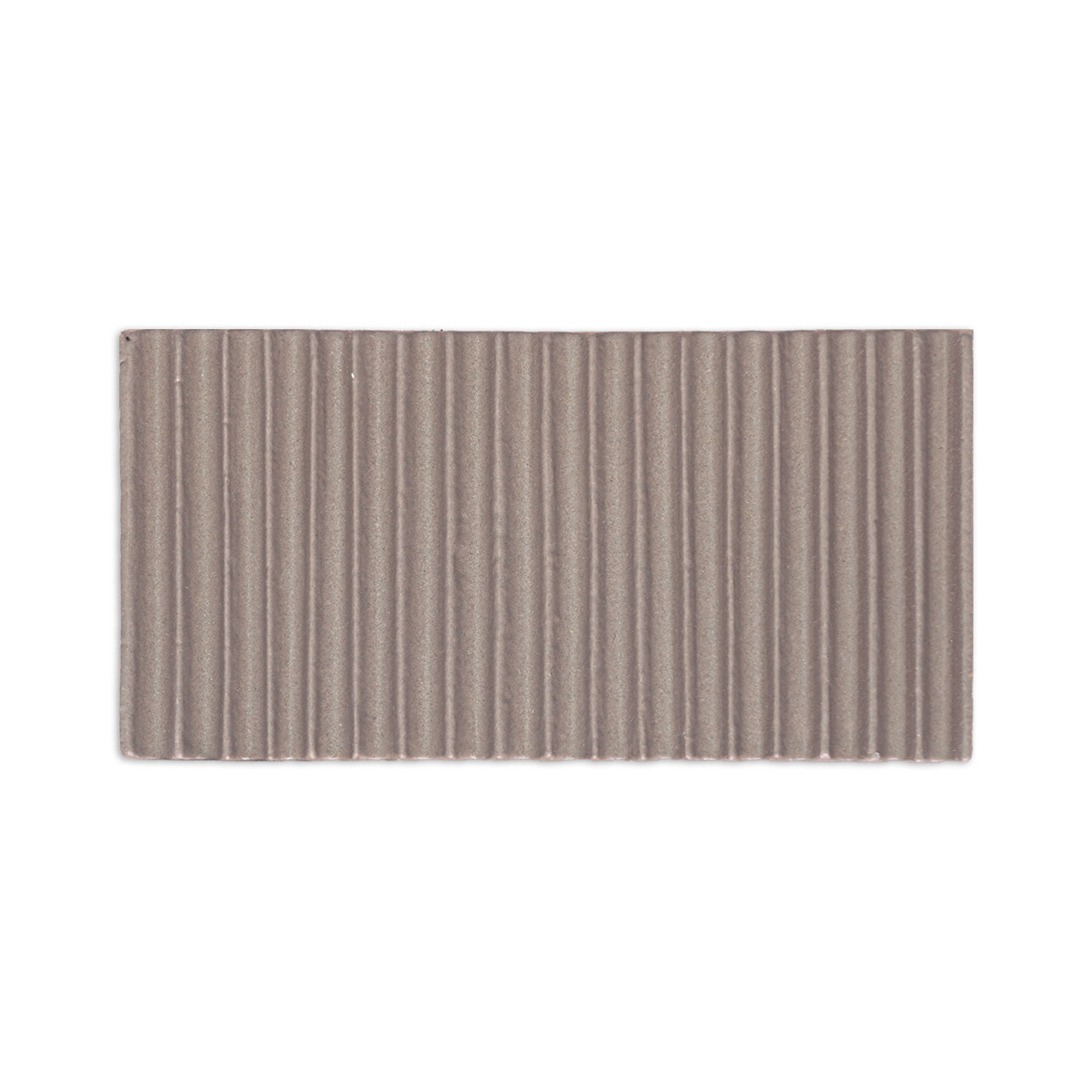 Brown corrugated tile sample by Clay Imports, a rectangular piece with distinct vertical ridges.