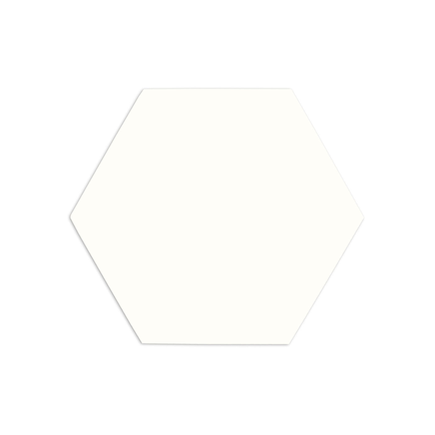 Off-white hexagonal chalk tile by Clay Imports with a subtle shadow.